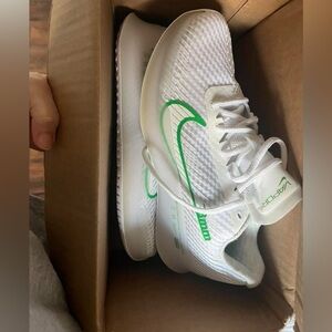 Nike White Running Sneakers with Bright Green Swoosh
